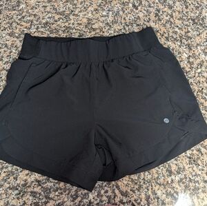 Black athletic shorts, Apana brand, size medium